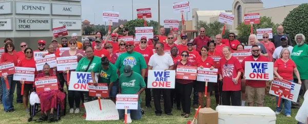 CWA Members in Apple Retail With Picket Signs